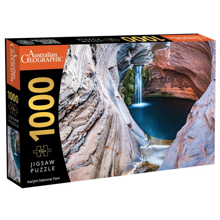 Australian Geographic 1000-piece jigsaw puzzle box for Karrijni National Park, featuring a scenic image of a waterfall in a red rock canyon.