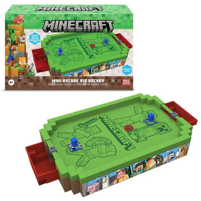 Minecraft Mini Arcade Air Hockey game shown with its retail box above and the assembled tabletop game below on a white background.