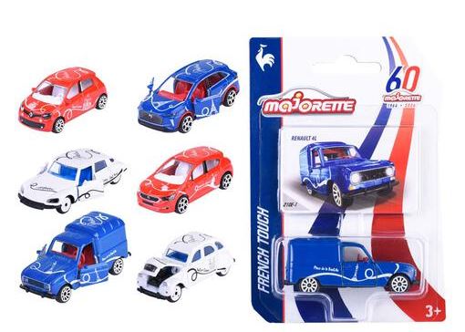 A set of six miniature model cars from the Majorette French Touch series, featuring various colors and models, packaged in a blister pack.
