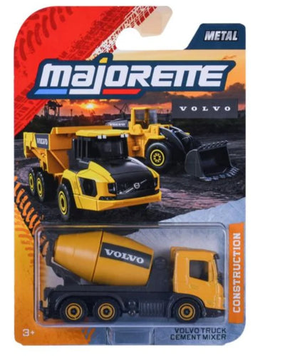 A Majorete metal construction toy set featuring a Volvo cement mixer truck in its original blister card packaging. The packaging displays yellow and black toy vehicles and a Volvo logo.