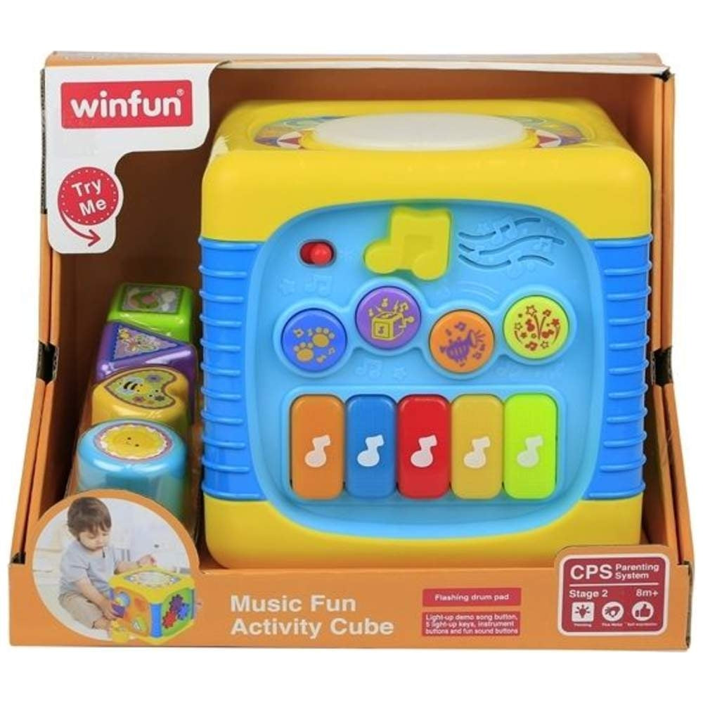 Winfun Music Fun Activity Cube toy in its original retail packaging, featuring a yellow and blue cube with colorful buttons, a small built-in piano, and three small stacking blocks.