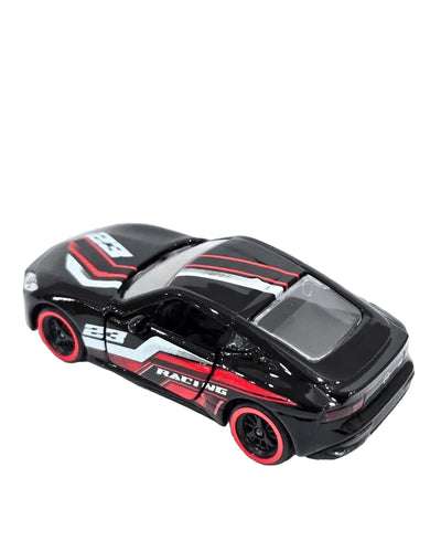 A black die-cast toy sports car with red and white racing decals, shown on a white background with a 'KINDER LOGS' logo overlay above it.