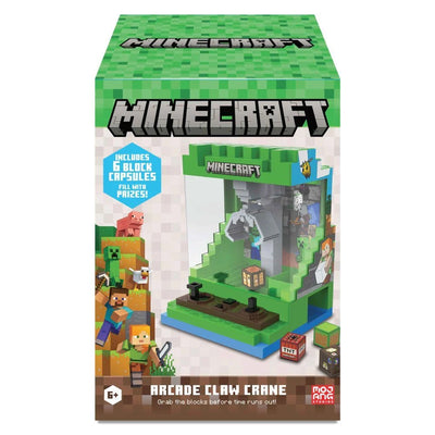 Minecraft toy claw crane packaging with pixelated graphics and text.